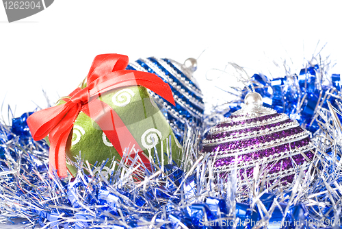 Image of christmas balls with and gift with decoration isolated on white