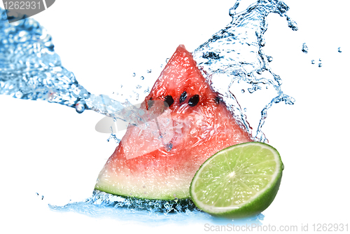 Image of watermelon with lime and water splash isolated on white