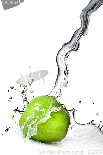 Image of fresh water splash on green apple isolated on white