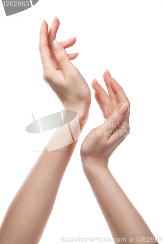 Image of figure from female hands isolated on white