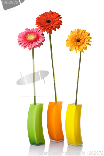 Image of Bouquet from daisy-gerbera in glass vase isolated on white