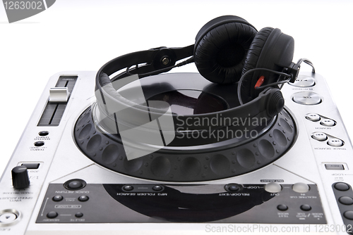 Image of dj mixer with headphones isolated on white