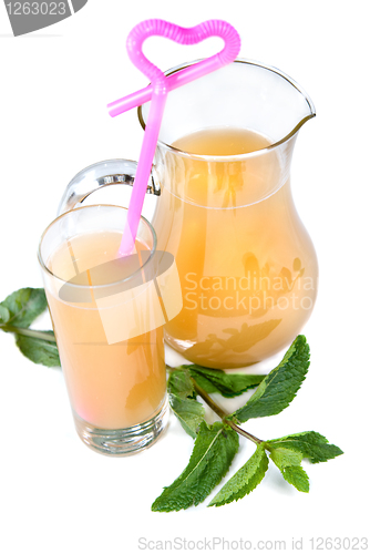 Image of cold drink in glass with mint isolated on white