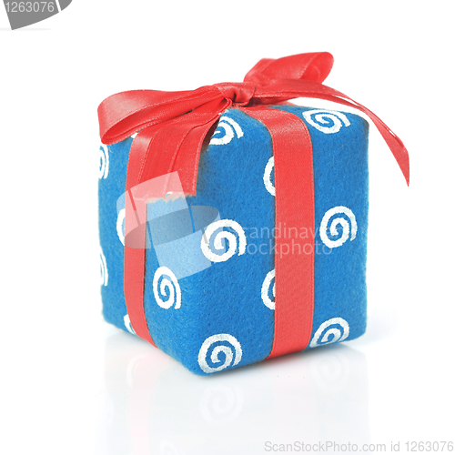 Image of Blue gift with red ribbon isolated on white