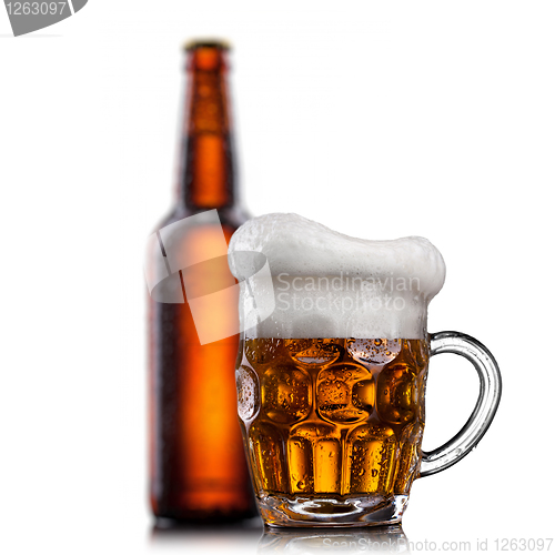 Image of Beer in glass with water drops isolated on white 