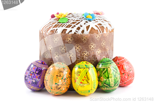 Image of easter eggs and cake isolated on white