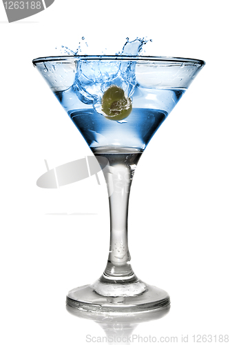 Image of Blue alcohol cocktail with splash isolated on white