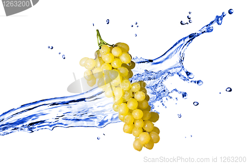 Image of yellow grape with water splash isolated on white