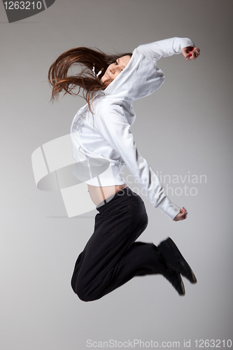 Image of attractive jumping woman