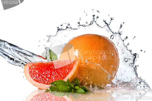 Image of Water splash on grapefruit with mint isolated on white