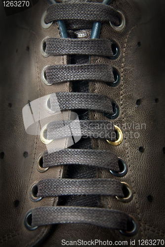 Image of close-up laces on the brown boots