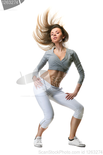 Image of young woman dance on white 