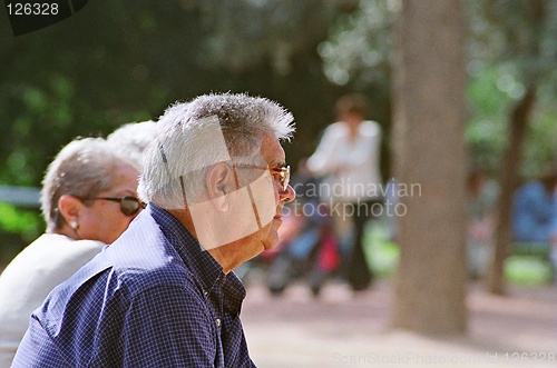 Image of old men on bank in park