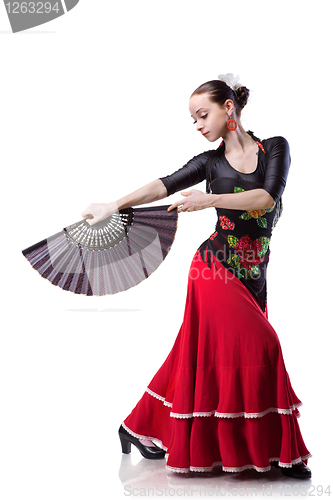 Image of young woman dancing flamenco isolated on white