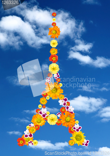 Image of eiffel tower from flowers against blue sky