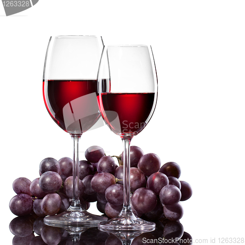 Image of Red wine in glasses with grape isolated on white