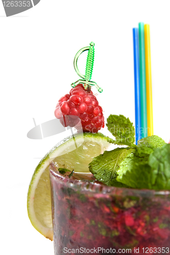 Image of Energy mohito with mint, lime and raspberry isolated on white