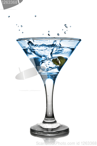 Image of Blue alcohol cocktail with splash isolated on white