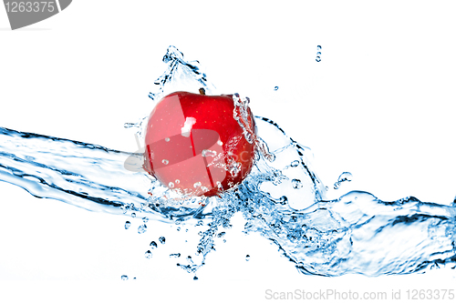 Image of Red apple and water splash isolated on white