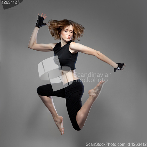 Image of attractive jumping woman dancer