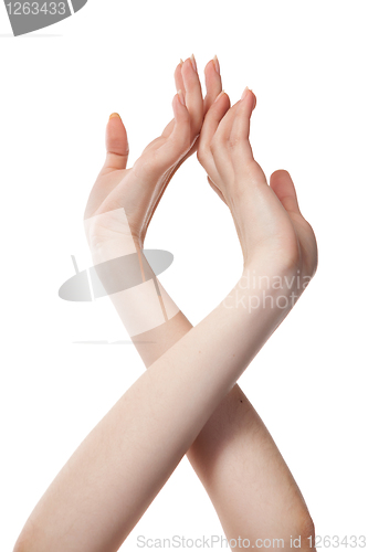 Image of figure from female hands isolated on white