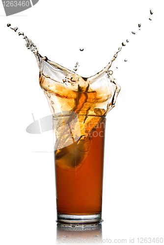 Image of Beautiful splash of cola in glass isolated on white