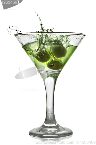 Image of Green alcohol cocktail with splash isolated on white