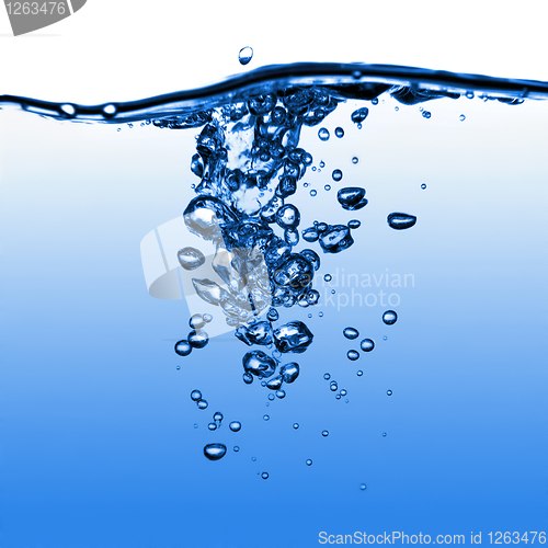 Image of water splash with bubbles isolated on white