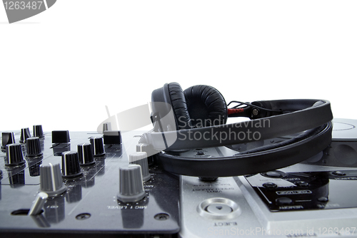 Image of dj mixer with headphones isolated on white