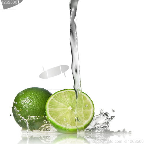 Image of Water splash on lime isolated on white