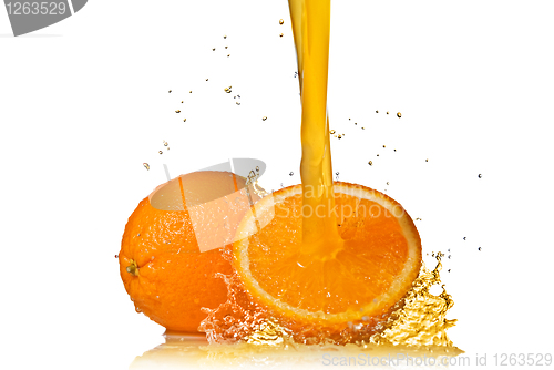 Image of Water splash on orange isolated on white
