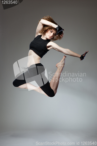 Image of attractive jumping woman 
