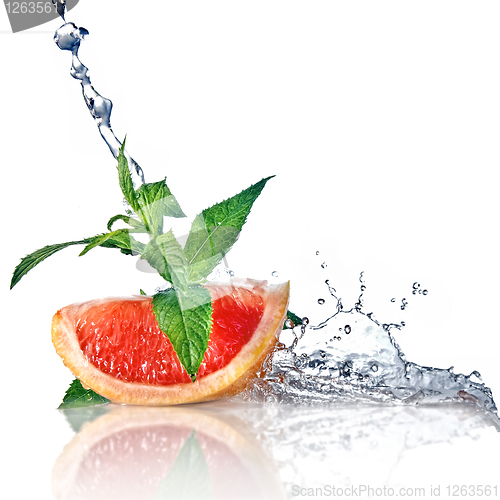 Image of Water splash on grapefruit with mint isolated on white