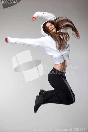Image of attractive jumping woman