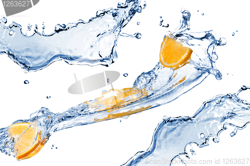Image of fresh water splashes and orange slices isolated on white