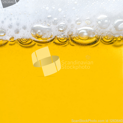 Image of beer with foam