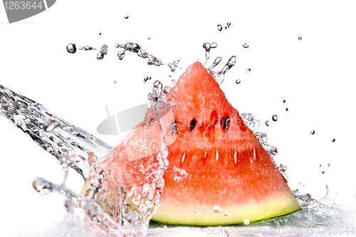 Image of watermelon and water splash isolated on white