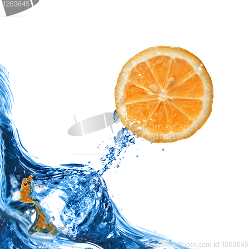 Image of Fresh orange fly out from blue water isolated on white