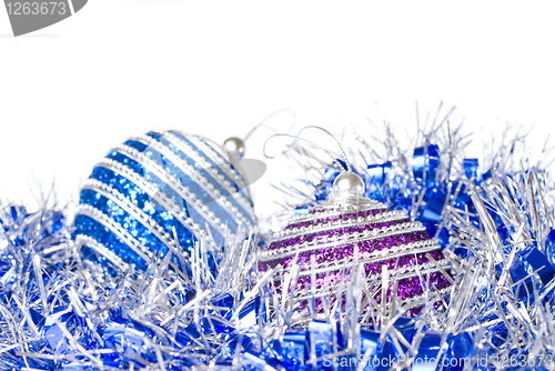 Image of pink and blue christmas balls with decoration isolated on white