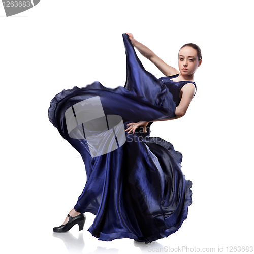Image of young woman dancing flamenco isolated on white 