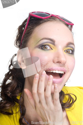 Image of Portrait of a surprised beautiful woman on white