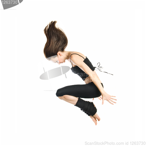 Image of jumping young dancer isolated on white background