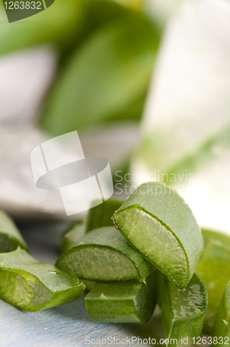 Image of aloe vera juice with fresh leaves