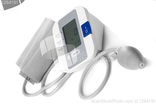 Image of Automatic digital blood pressure monitor isolated on white