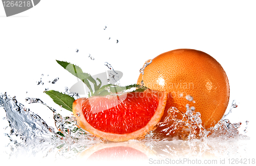 Image of Water splash on grapefruit with mint isolated on white