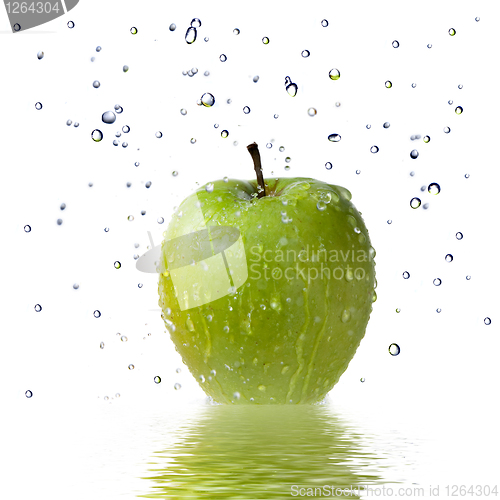 Image of fresh water drops on green apple isolated on white
