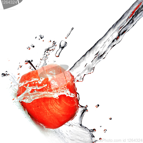 Image of fresh water splash on red apple isolated on white