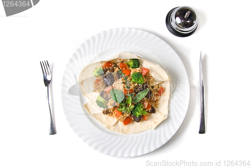Image of risotto with fork, knife and restaurant ring isolated on white