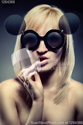Image of attractive woman with funny glasses
