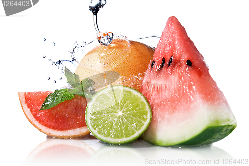 Image of Water splash on fresh fruits isolated on white